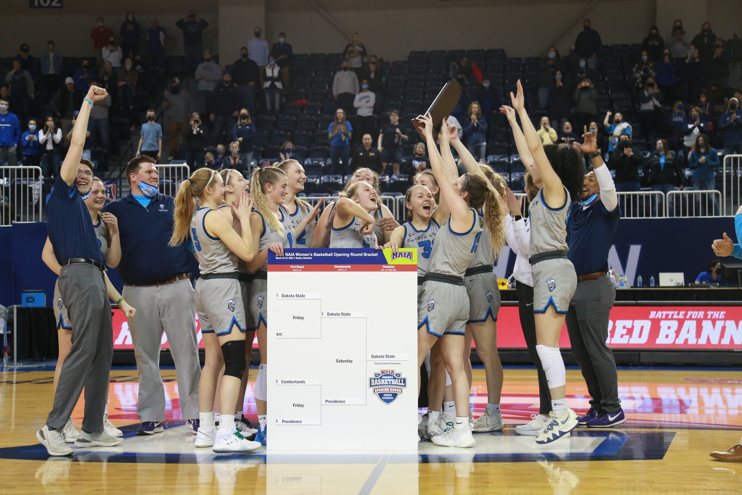 DSU women's basketball team celebrating a win